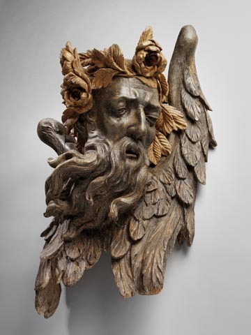 Houten beeld van mannenhoofd